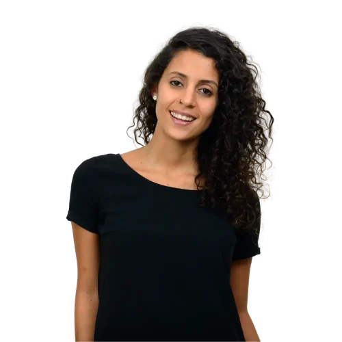 a woman with long curly hair wearing a black shirt