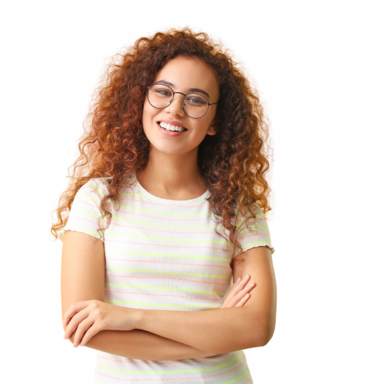 a smiling woman with curly brown hair, glasses, and a light colored t shirt